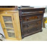A Victorian stained wood chest of four long drawers (top damaged), 109cm, an elm open-shelved corner