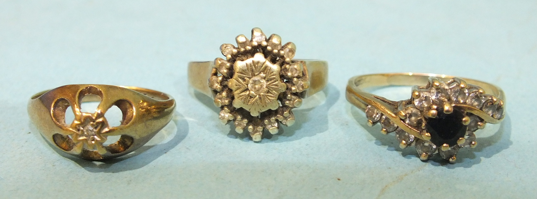 Three 9ct gold gem set rings, 4.5g.