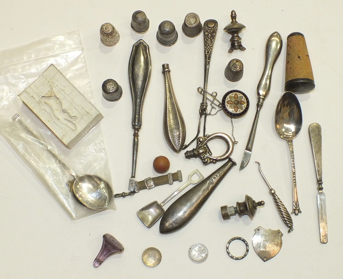 Three Continental white metal salts, a horn-handled toddy ladle, silver-handled manicure items,