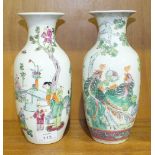 A pair of 20th century Oriental famille rose baluster vases, 24cm high, (2).