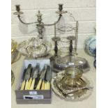 A plated two-branch candelabrum, a plated entrée dish and cover, plated cutlery and other plated