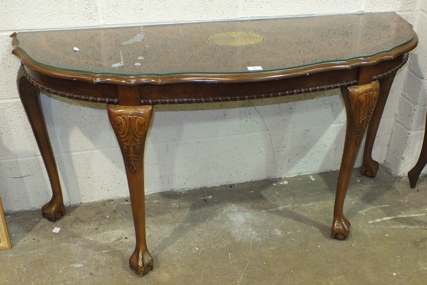 A reproduction walnut hall table with single drawer, 75cm wide and another reproduction hall table.