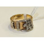 A 9ct gold buckle ring set white stones, size N, 5g.