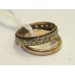 A 9ct gold wedding band, size I and a 9ct gold eternity ring set white stones, size L, 4.3g, (2).