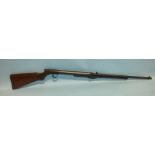 A Standard Model 2 22 calibre air rifle, no.S4354, underlever, walnut stock, cylinder and tap