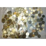 A collection of British and foreign coinage, includes a small quantity of silver coins.