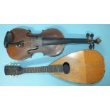 A violin with one-piece back, no label, cased and a mandolin, cased, (2).