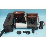 A pair of Carl Zeiss Jena Jenoptem 10 x 50W binoculars, a pair of Swift Audubon binoculars and a