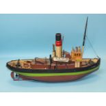 An assembled kit 1:50 scale model of St Canute tugboat, 56cm long.
