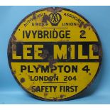 An AA circular enamel road sign "Ivybridge 2, Lee Mill, Plympton 4, London 204, Safety First",