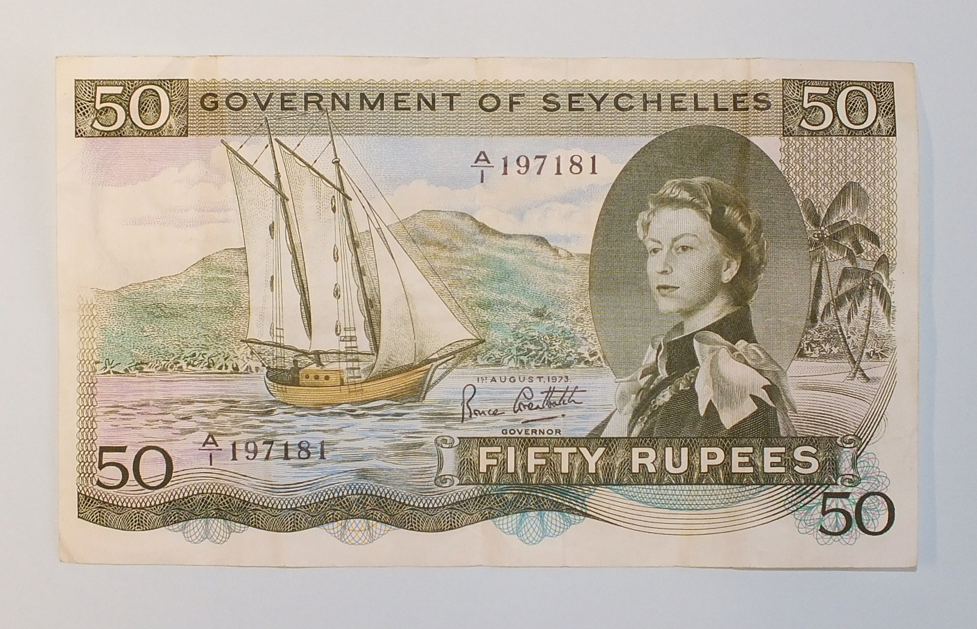 A Government of Seychelles 50 rupees bank note, A/1 197181, dated 1st August 1973, centre crease.