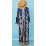 A deep blue satin coat, possibly Indian, with applied gold thread work, flared sleeves and side