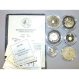 A Royal Mint 1993 Coronation 40th Anniversary Silver Proof Crown, a 1994 Tercentenary of the Bank of