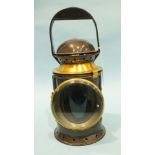 A black-painted three-aspect railway hand lamp by Eli Griffiths & Sons, with burner, reservoir,