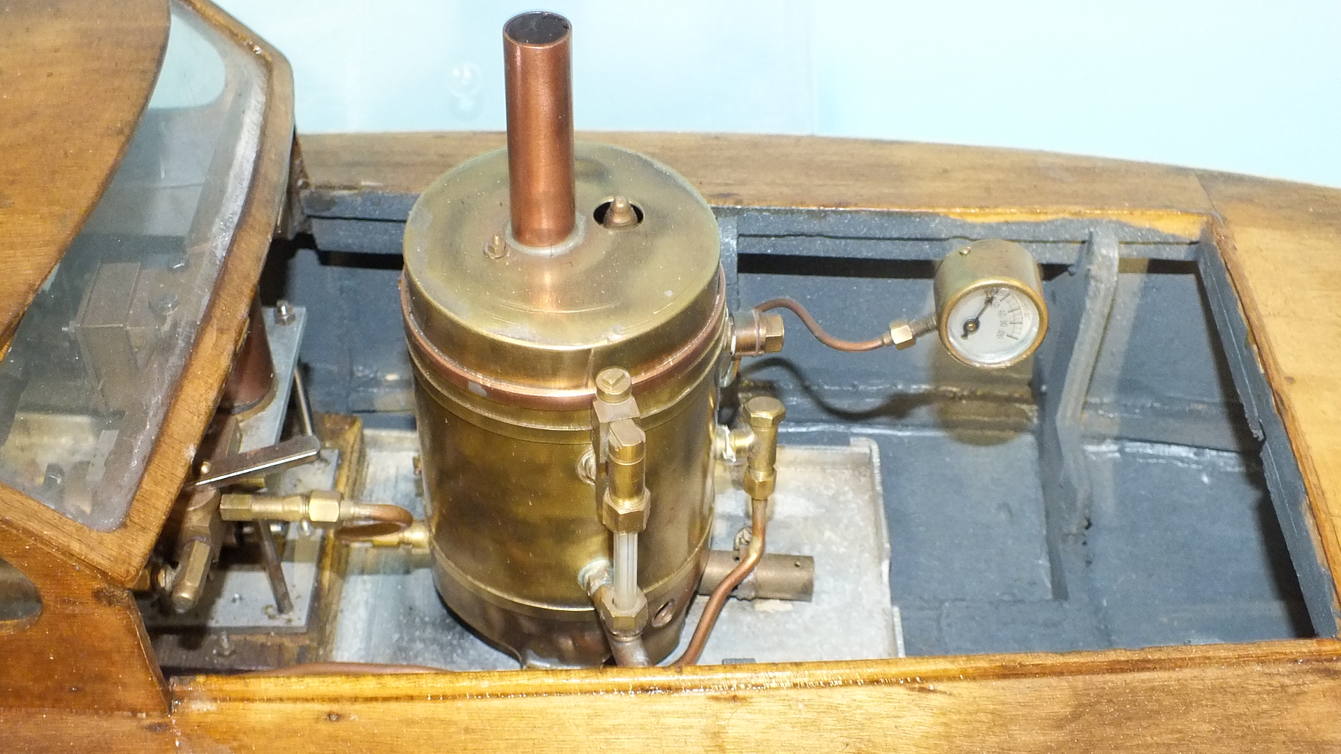 A scratch built live steam model of a boat, of wooden construction with brass boiler and funnel, - Image 3 of 3