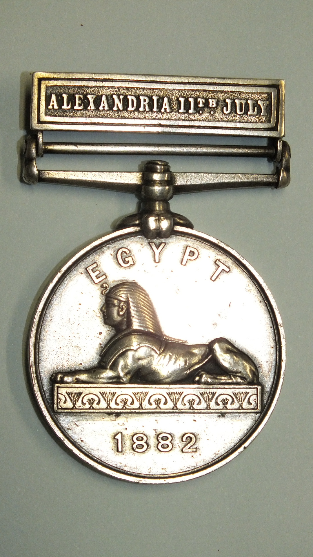 An Egypt Medal 1882 with Alexandria 11th July bar, awarded to W Balkwill, AB, HMS Invincible.