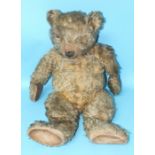 A Chiltern Hugmee teddy bear, c1930's, no eyes, shaved muzzle with vertically-stitched nose, mouth