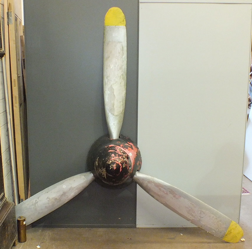 A post-war 3-bladed aeroplane propeller with wooden boss, blade length 105cm, wooden boss a/f.