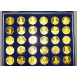 A collection of thirty gilt metal medallions, "Greatest Britons" by G Colley for Slade Hampton &