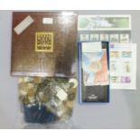 A collection of mainly foreign coinage, (includes silver coins), a Royal Mail special stamp book for