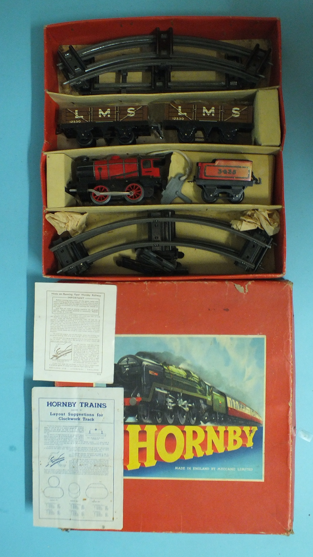 Hornby O gauge, M1 Goods Set, comprising a red c/w M1 0-4-0 locomotive and 3435 tender, rolling