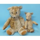 A 1930's/40's teddy bear, possibly Merrythought, golden mohair plush, glass eyes, worn nose,