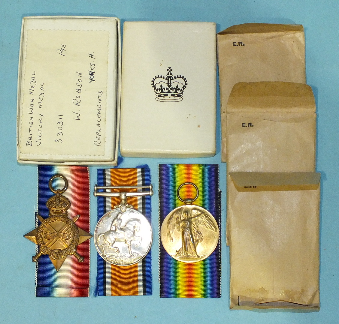 An official replacement group of three WW1 medals awarded to 2486/30311Pte W Robson, Yorks H, in