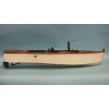 A scratch built live steam model of a boat, of wooden construction, 109cm long, (a/f).