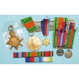 A WWI Victory Medal, a 1914-15 Star, (different recipients), three WWII miniatures, various ribbons,