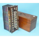 A 19th century inlaid rosewood flutina accordion with nineteen mother-of-pearl and five brass