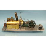 A live steam horizontal stationary engine, metal base 15 x 52.5cm, funnel 22cm high, (untested).