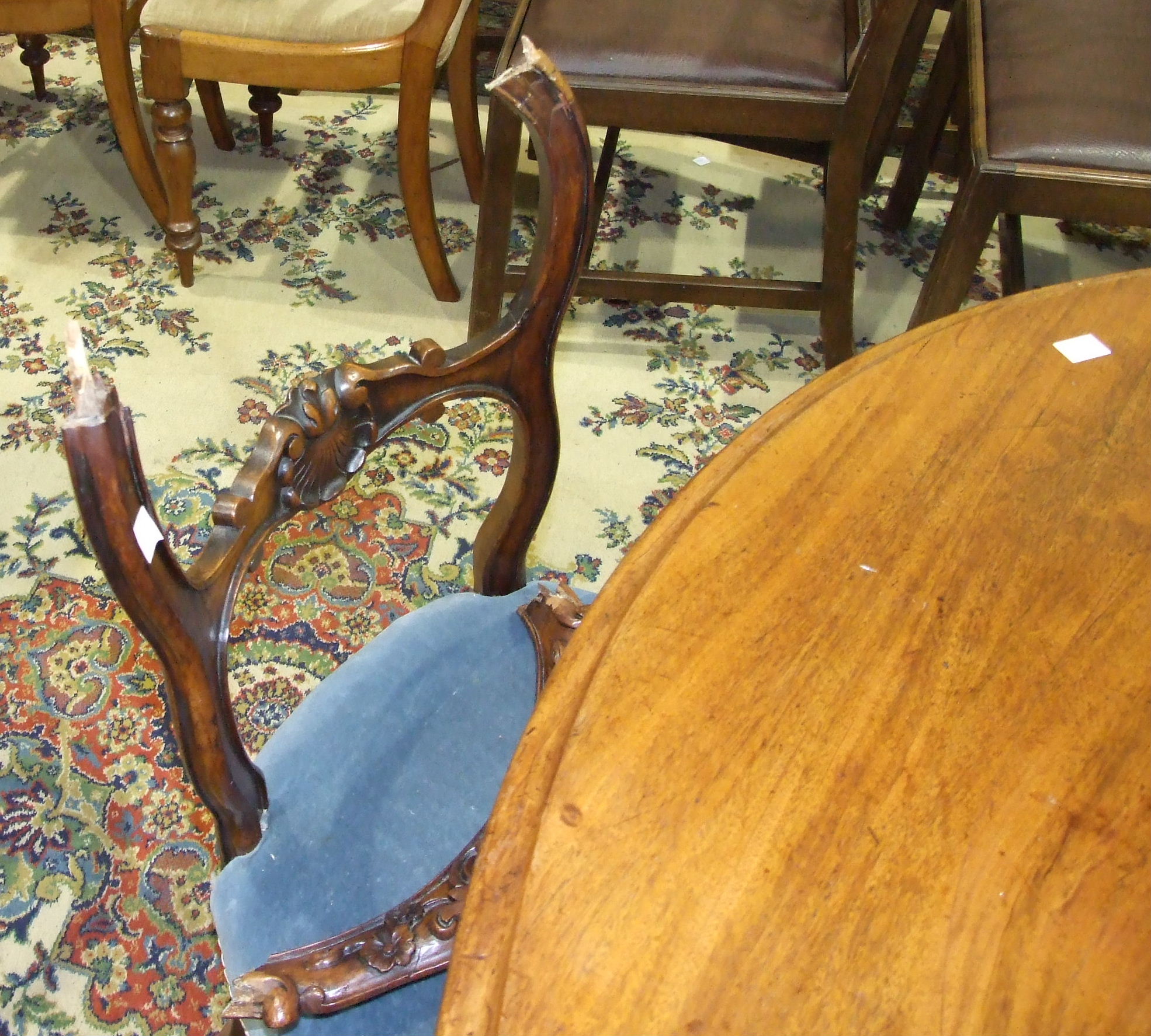 A Victorian mahogany circular breakfast table with moulded border, on turned column and carved - Image 2 of 3