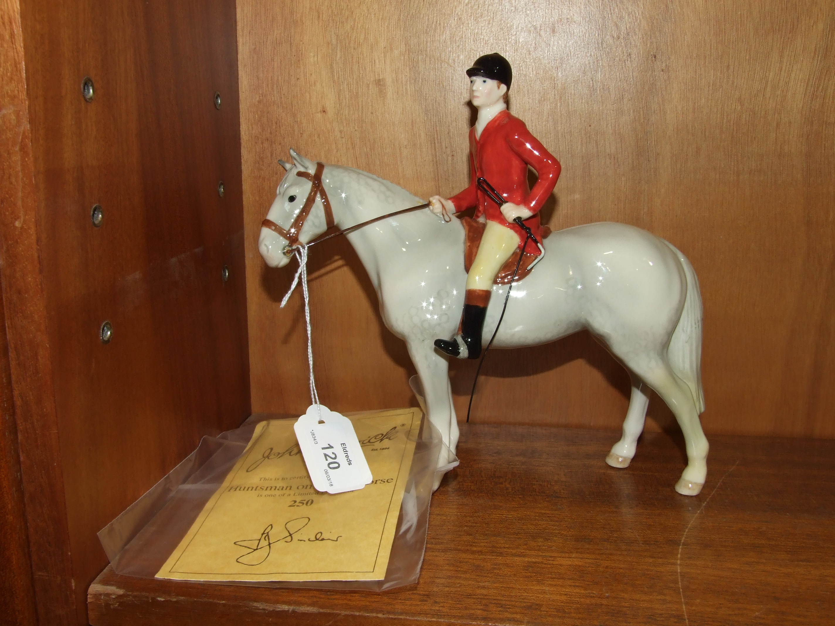 A John Beswick limited edition Huntsman on Grey Horse, 22cm high, numbered 167/250, with