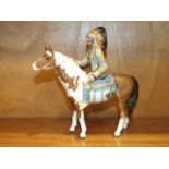 A Beswick model, Mounted Indian, 22cm high.