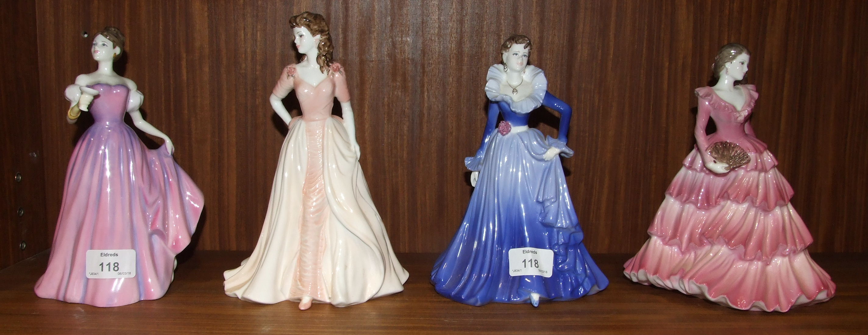 A Royal Doulton figurine, Congratulations to You, HN4306 and three Coalport figurines: Jaqueline,