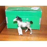 A Beswick model, Foal, medium, almost stood square, rocking horse grey gloss, 12cm high.