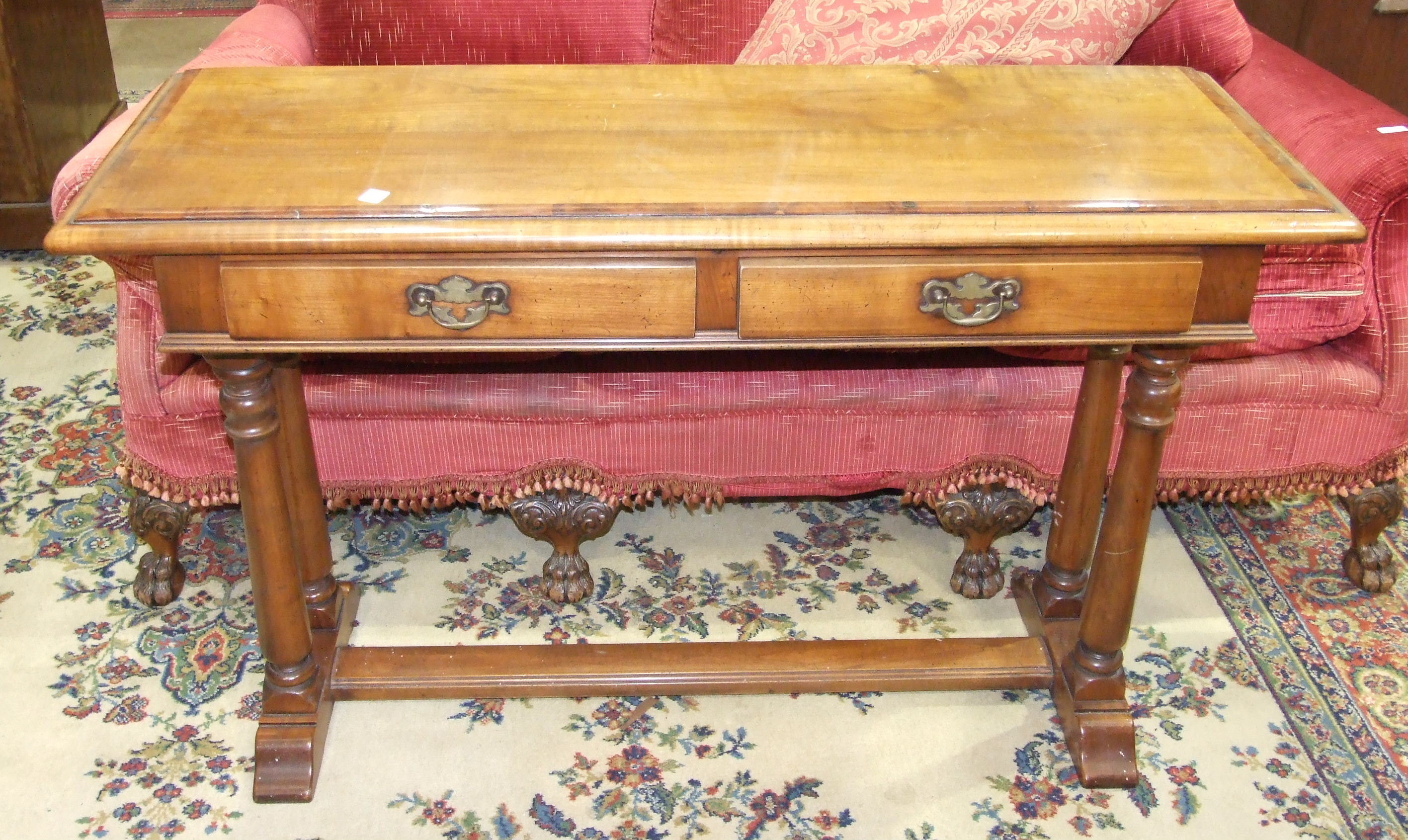 Simpsons of Norfolk, a hardwood and yew inlay hall table, the rectangular top above two frieze