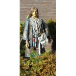 A life-size moulded composite figure of an Indian squaw, with horse hair wig, 168cm high.