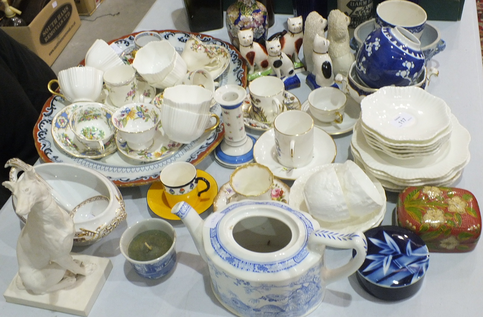 A collection of 19th and 20th century cabinet cups and saucers, an Ashworth stoneware meat dish