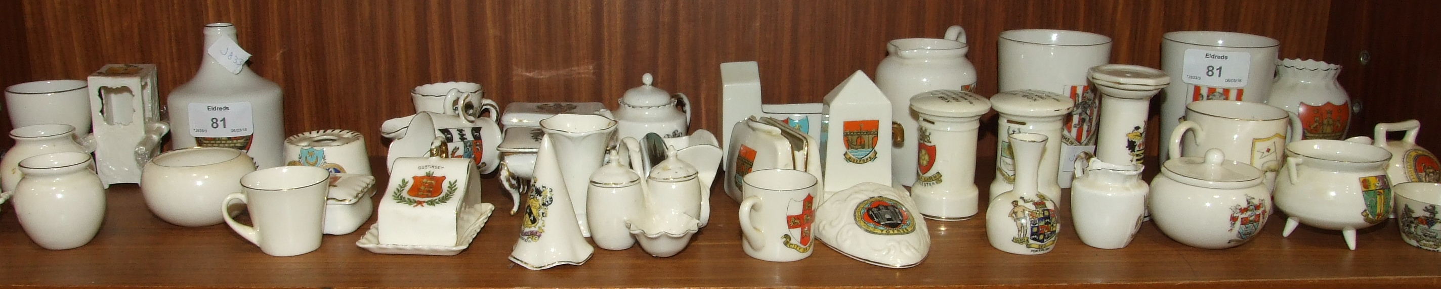 Thirty-nine pieces of crested china, including a W H Goss sedan chair and Dart Sack bottle, Foley