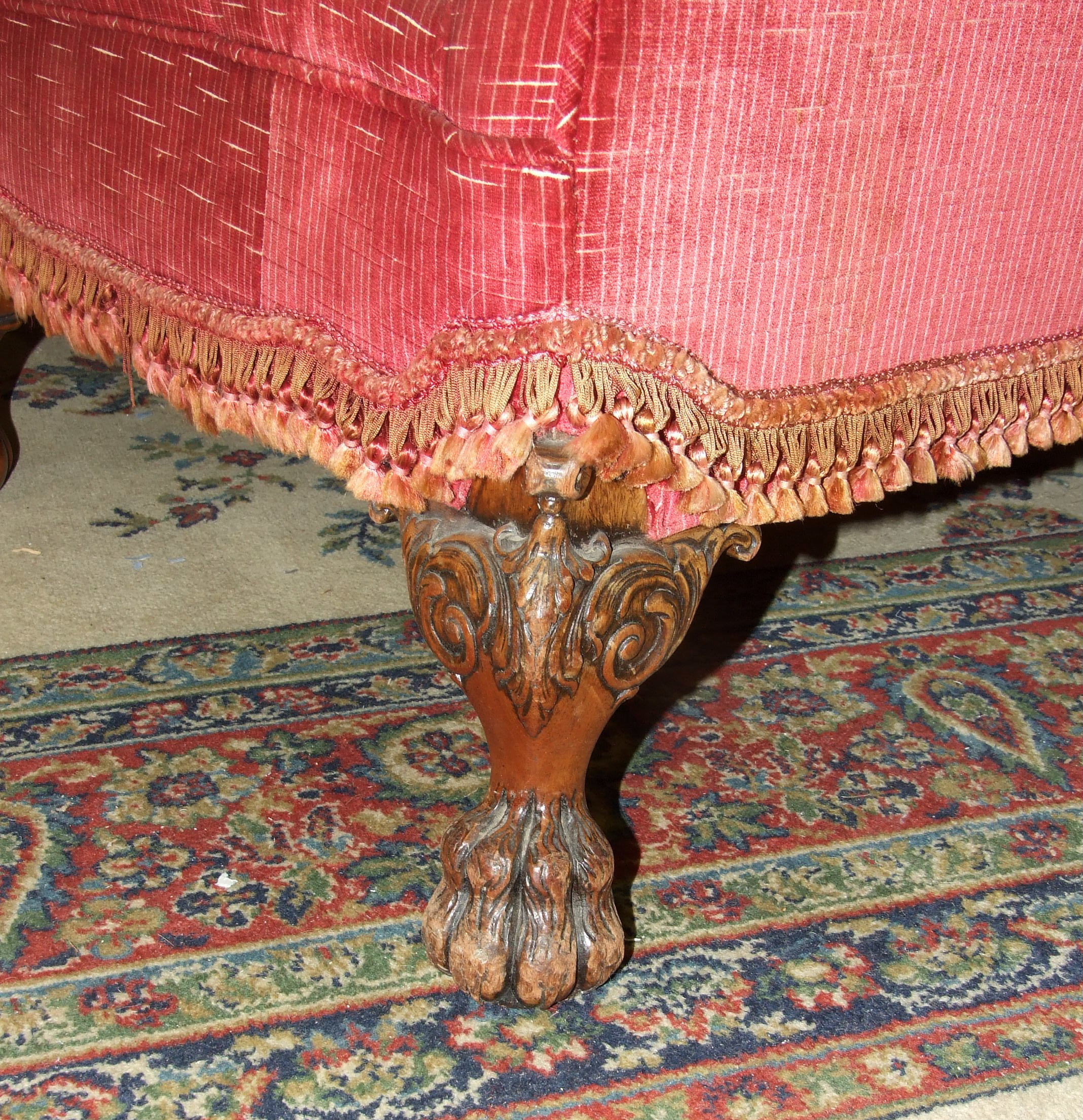 An early 20th century upholstered deep-seated three-seater settee with carved front feet, and a pair - Image 3 of 3