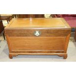 A 20th century rectangular camphor wood chest on bracket feet, 102cm wide, 72cm high.