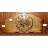 A Junghans walnut case striking mantel clock, 53cm wide,23cm high.