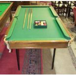 A half-size slate bed snooker/billiards table, 191 x 100cm overall, together with cues and balls.