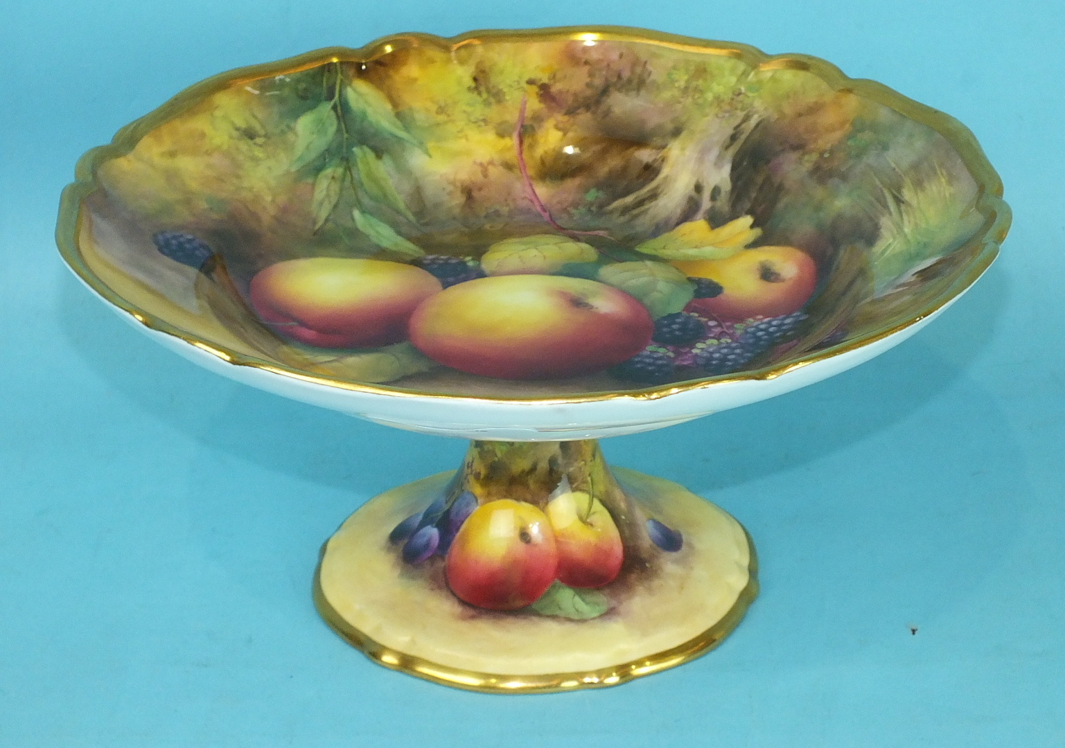 A Royal Worcester porcelain comport decorated with fruit painted by Horace Price, date code for