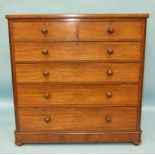 A 19th century rosewood chest of two short and four long drawers, on plinth base with bun feet,
