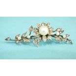 A French pearl and diamond spray brooch c1900 set one large and four small cultured pearls, the