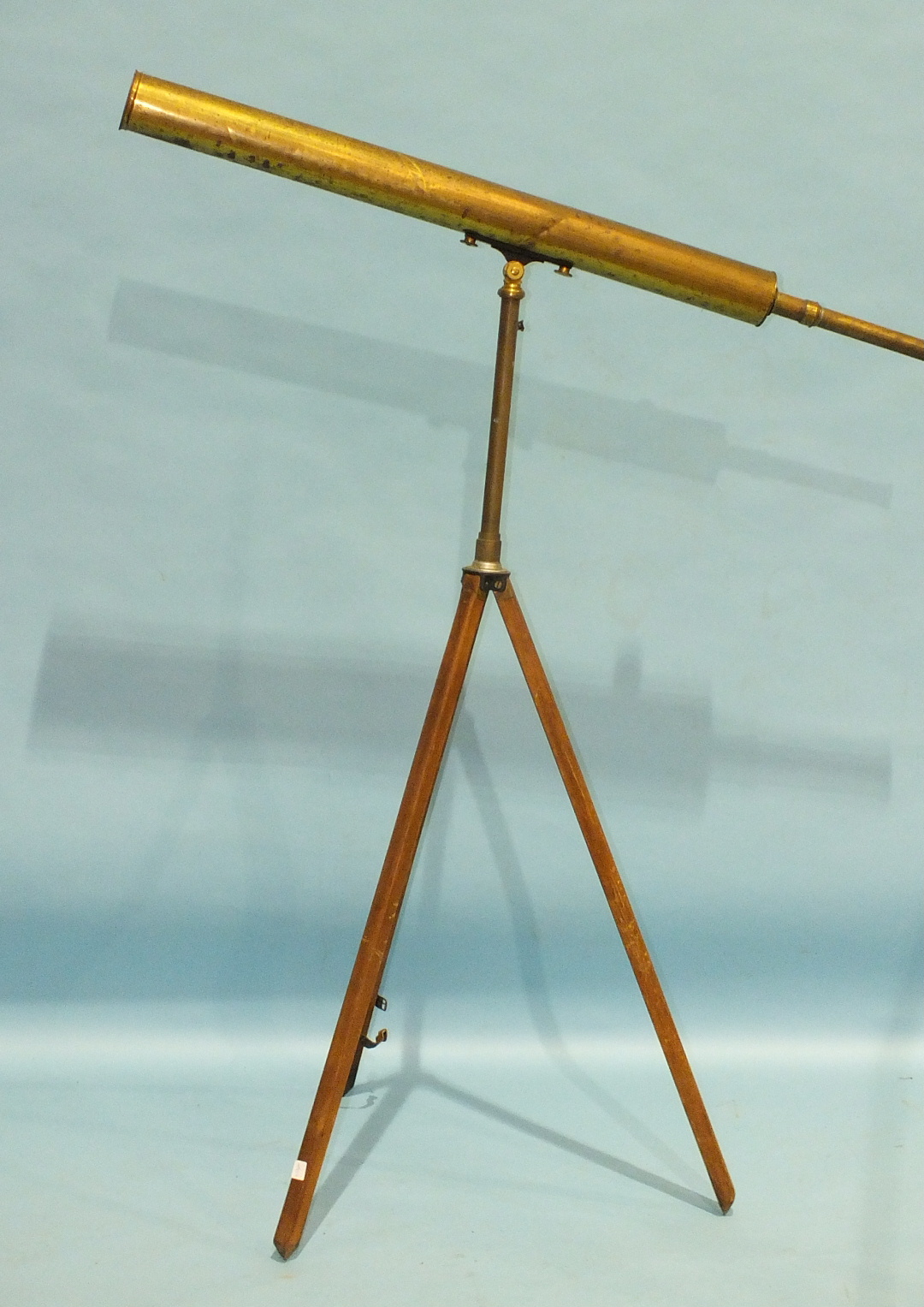 Aitchison & Co, 428 Strand & Branches, a brassed 3" single-draw telescope, 133cm open, on folding