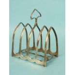 A silver four-division toast rack of arch form, London 1899, 10.5cm wide, 13cm high, ___5oz.