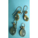 A pair of yellow topaz earrings, each with pendeloque topaz suspended below a round-cut topaz, 2cm
